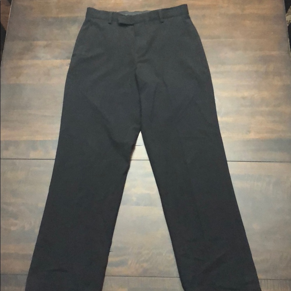 Black Calvin Klein dress pants.